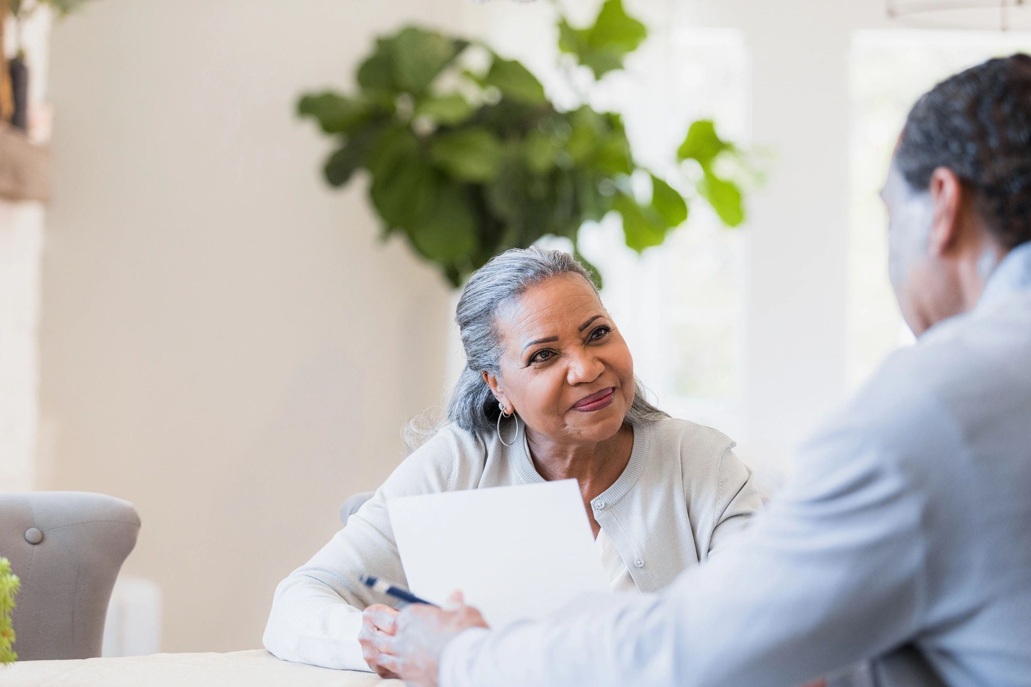 Client listening to a financial advisor