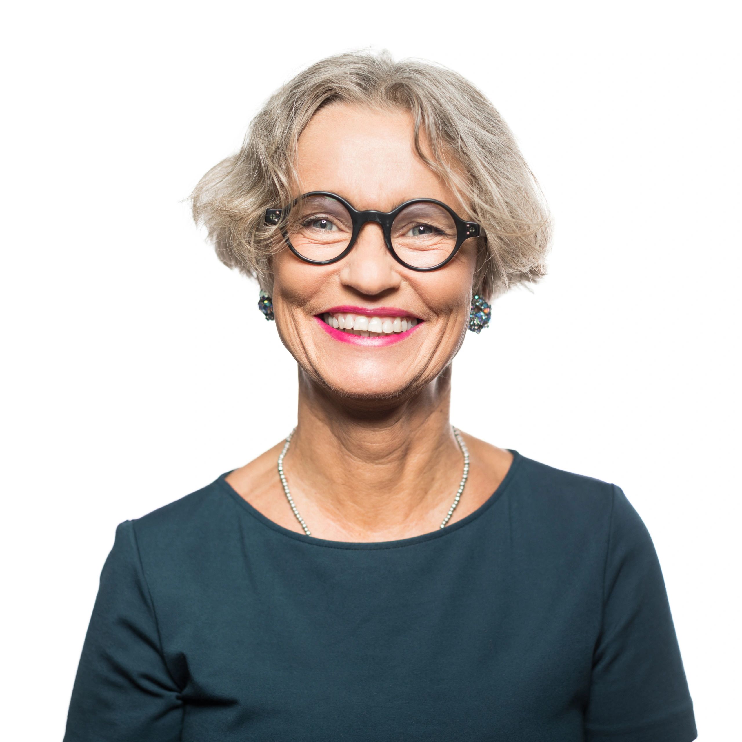 Professional headshot of a senior woman